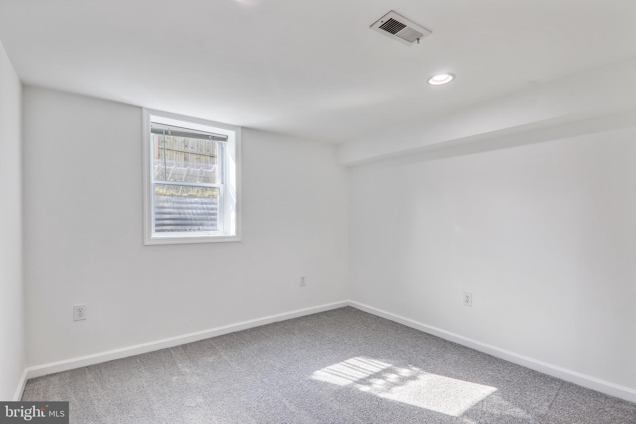 11506 Goodloe Road Silver Spring, MD 20906 - Photo 22 of 48 Lower level bedroom w/egress window