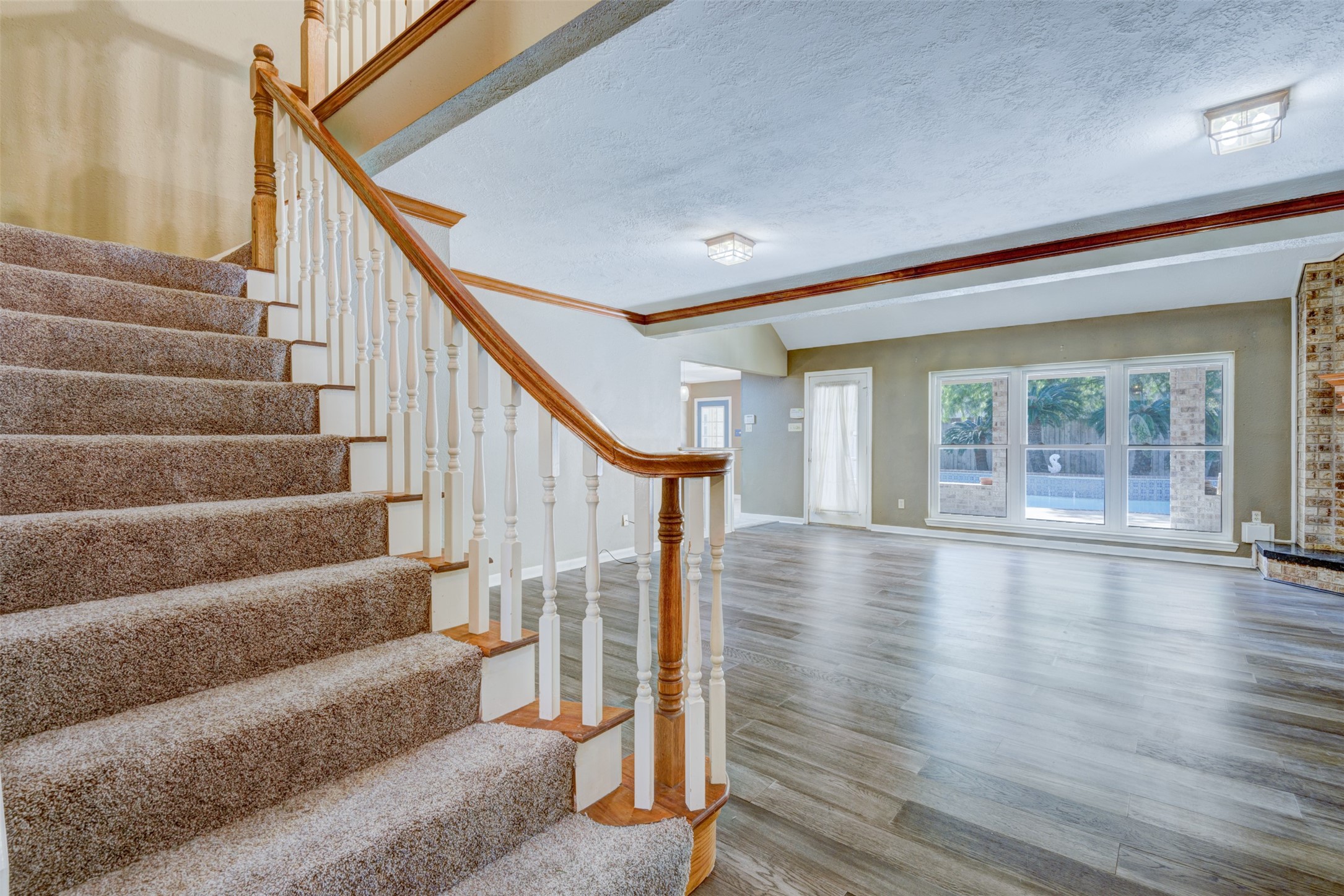 6502 Inverness Way Pasadena, TX 77505 - Photo 6 of 31 Stairs lead to the game room.