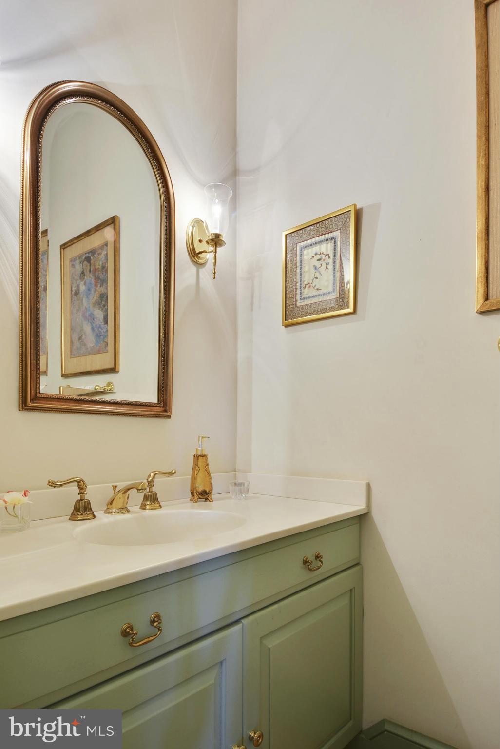 5615 Patterson Road Baldwin, MD 21013 - Photo 11 of 26 a bathroom with a sink and a mirror