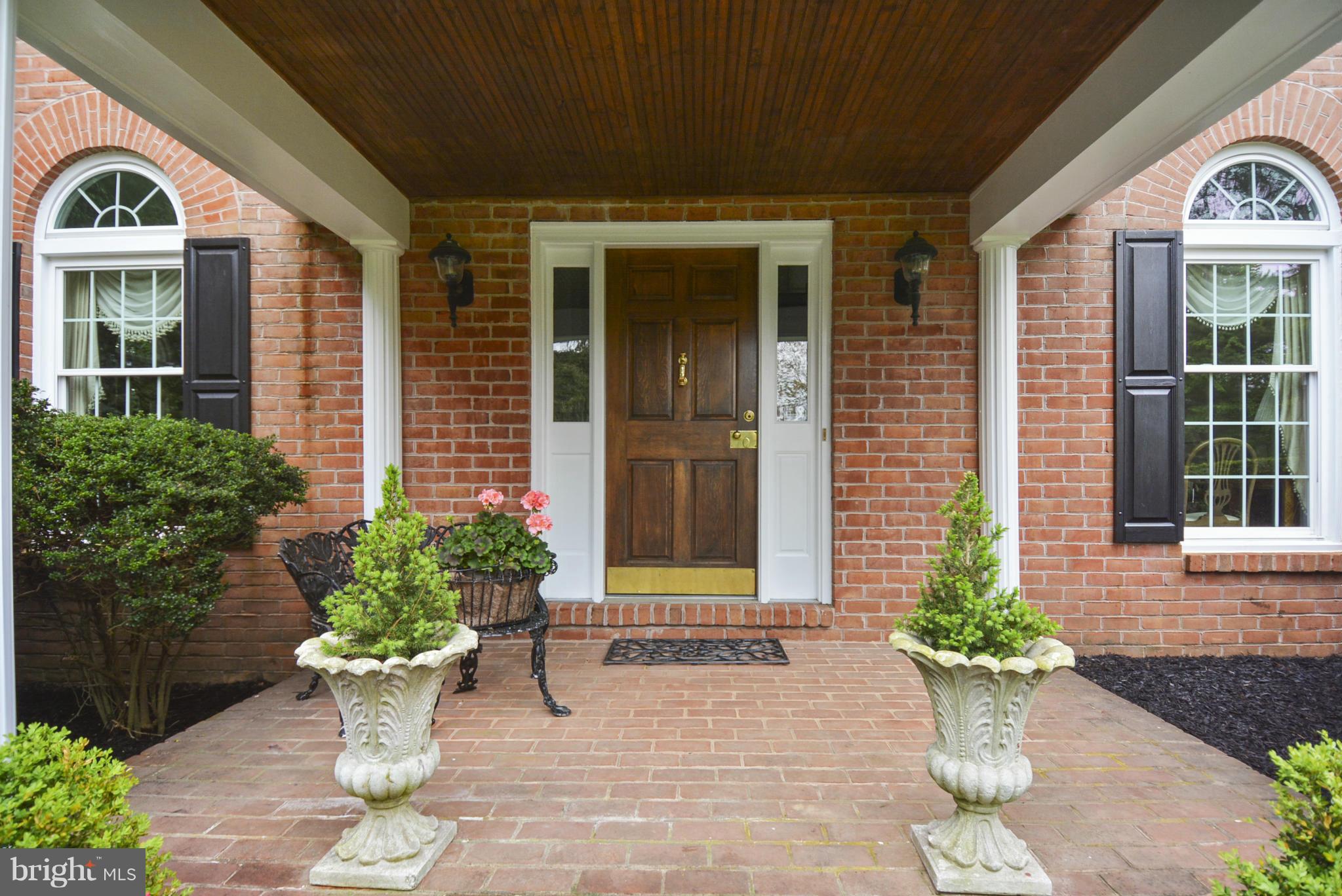 5615 Patterson Road Baldwin, MD 21013 - Photo 21 of 26 a view of a brick house with potted plants