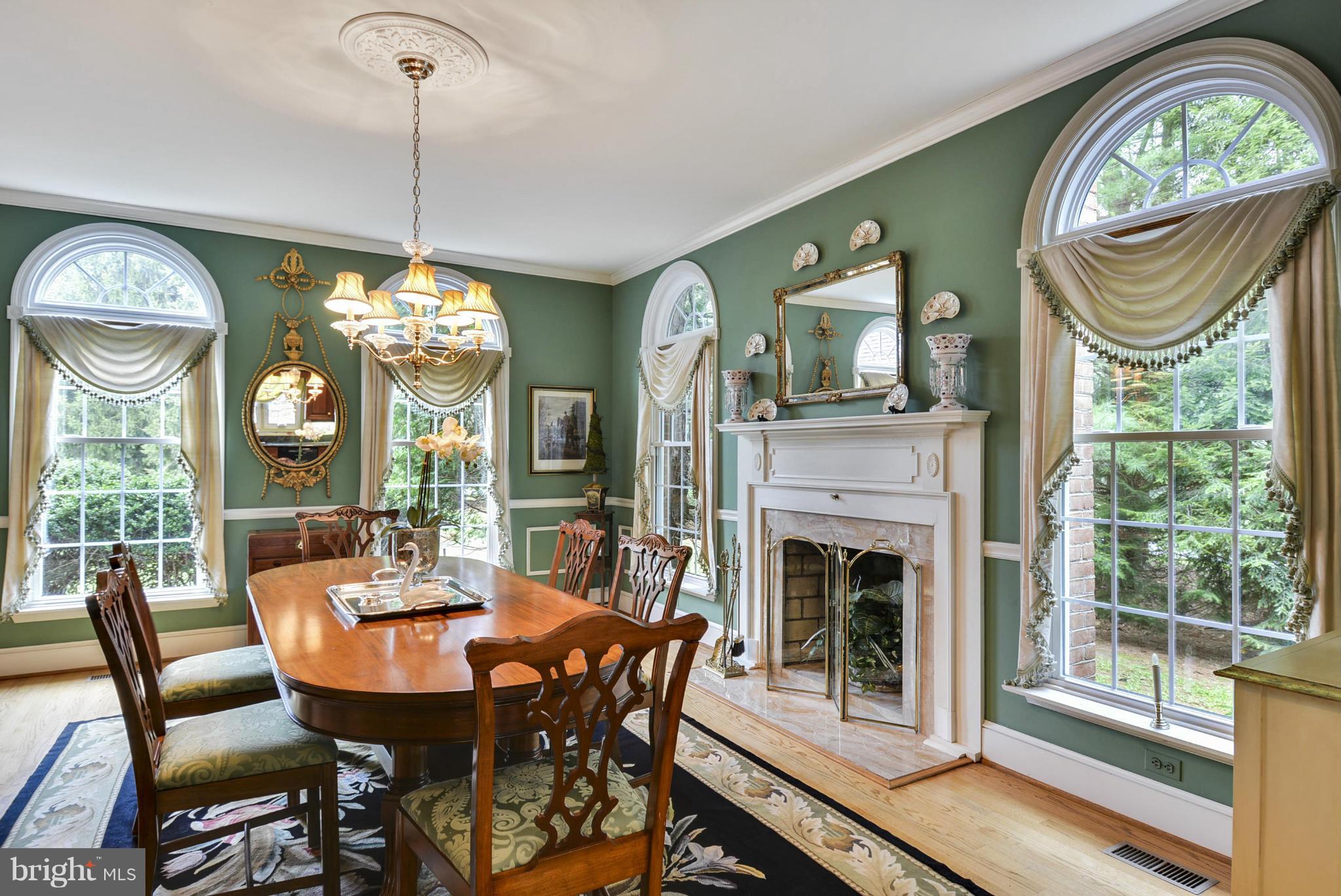 5615 Patterson Road Baldwin, MD 21013 - Photo 4 of 26 a view of a dining room with furniture a chandelier and large windows