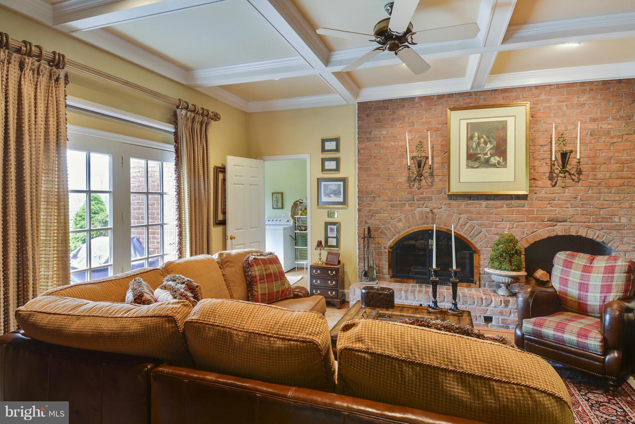 5615 Patterson Road Baldwin, MD 21013 - Photo 7 of 26 a living room with a couch and a fireplace