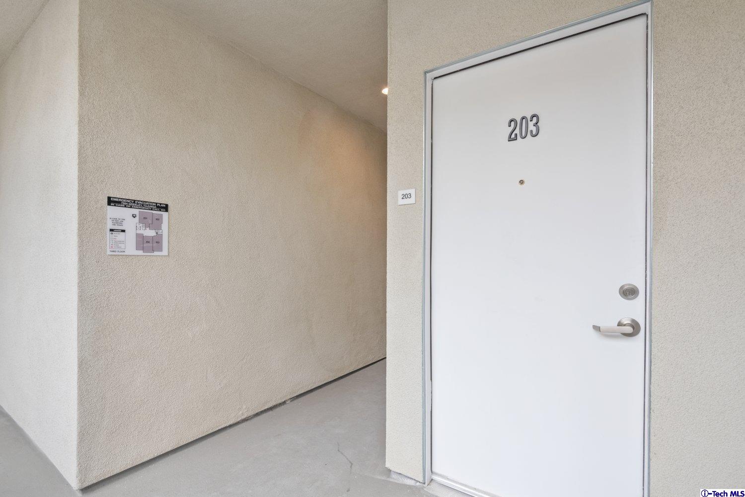 7064 Greeley Street, Unit 203 Tujunga, CA 91042 - Photo 16 of 42 a view of a hallway