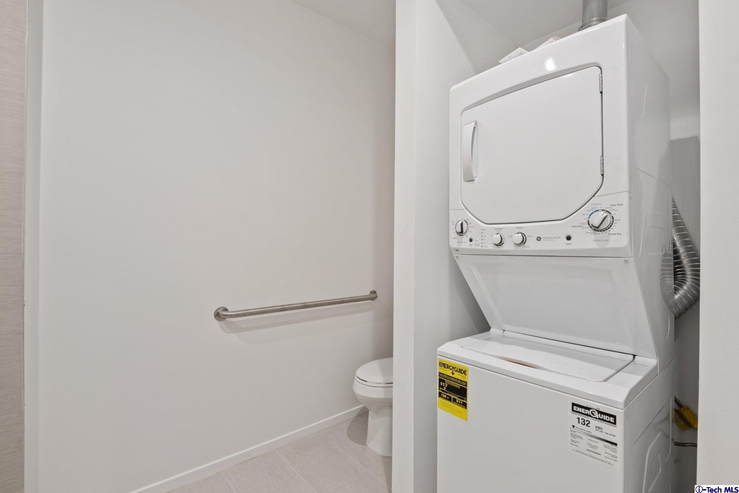 7064 Greeley Street, Unit 203 Tujunga, CA 91042 - Photo 27 of 42 a utility room with dryer and washer