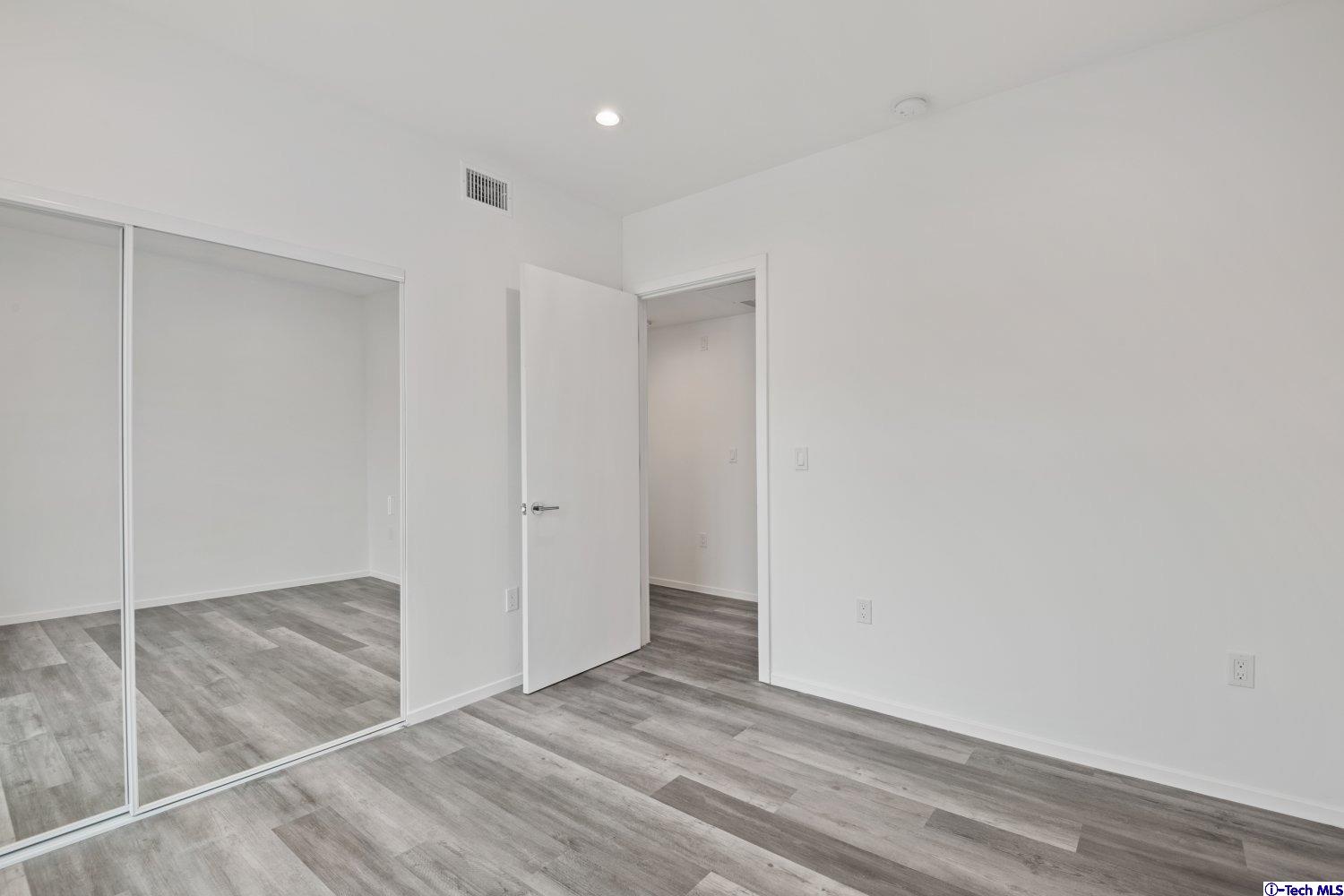 7064 Greeley Street, Unit 203 Tujunga, CA 91042 - Photo 30 of 42 a view of an empty room