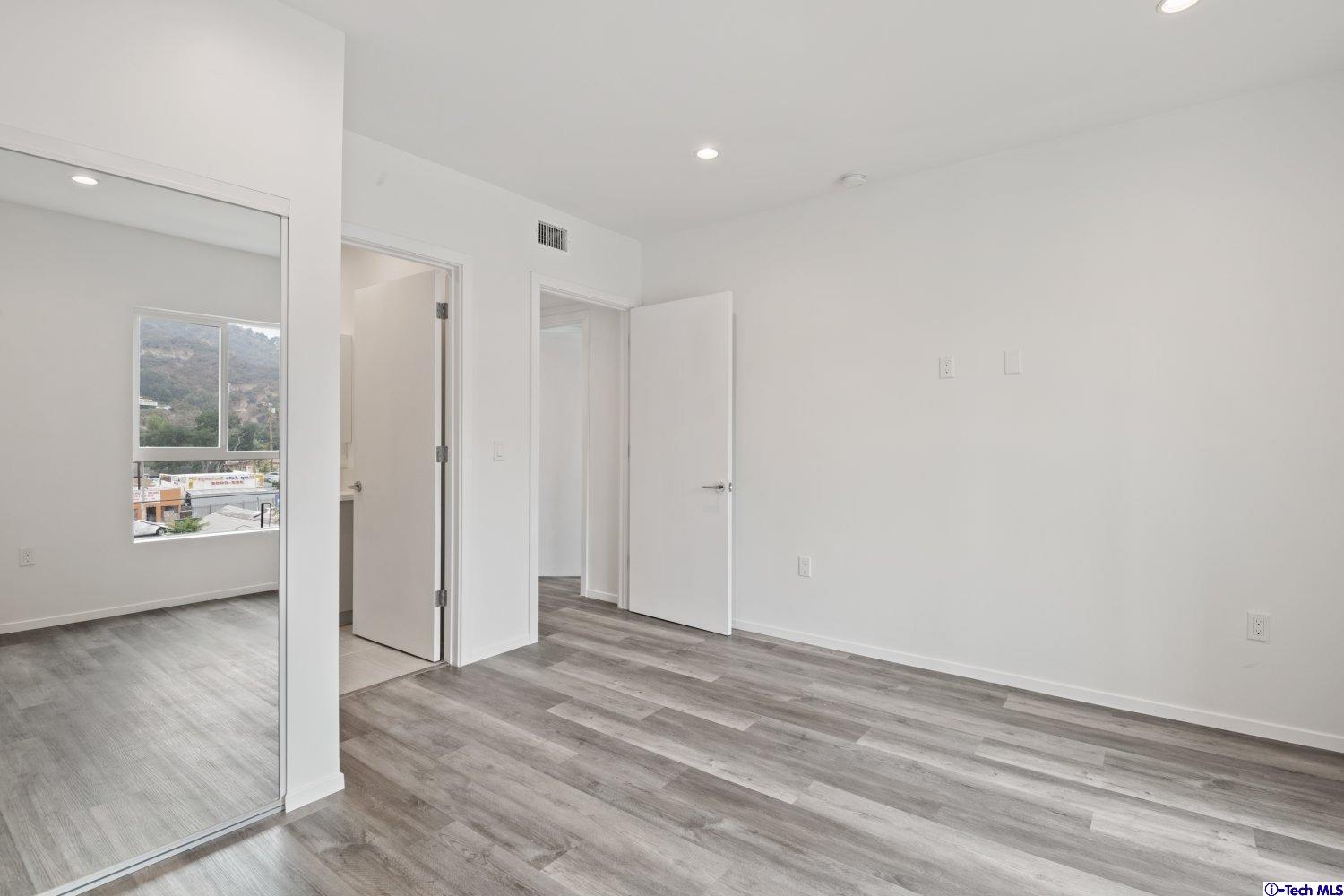 7064 Greeley Street, Unit 203 Tujunga, CA 91042 - Photo 36 of 42 a view of an empty room