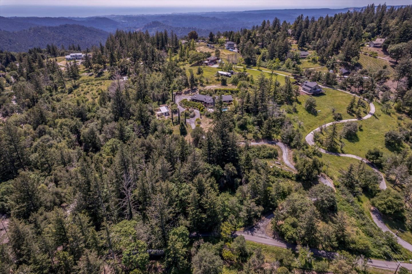 25149 Radonich Road Los Gatos, CA 95033 - Photo 46 of 47 an aerial view of residential house with parking and trees