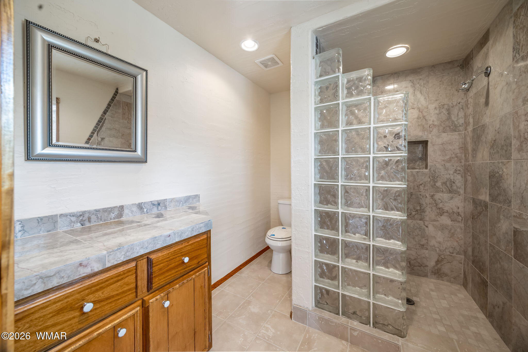 2937 Ransack Road Overgaard, AZ 85933 - Photo 24 of 34 a view of a bathroom with a granite countertop sink