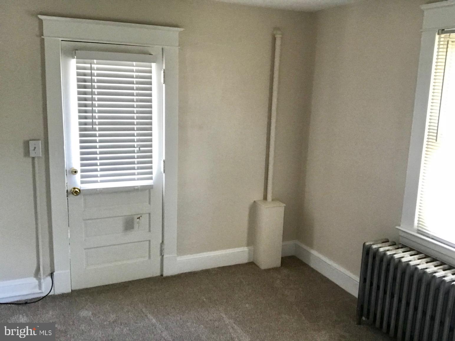 3525 St James Road Windsor Mill, MD 21244 - Photo 15 of 27 a view of an empty room with a window