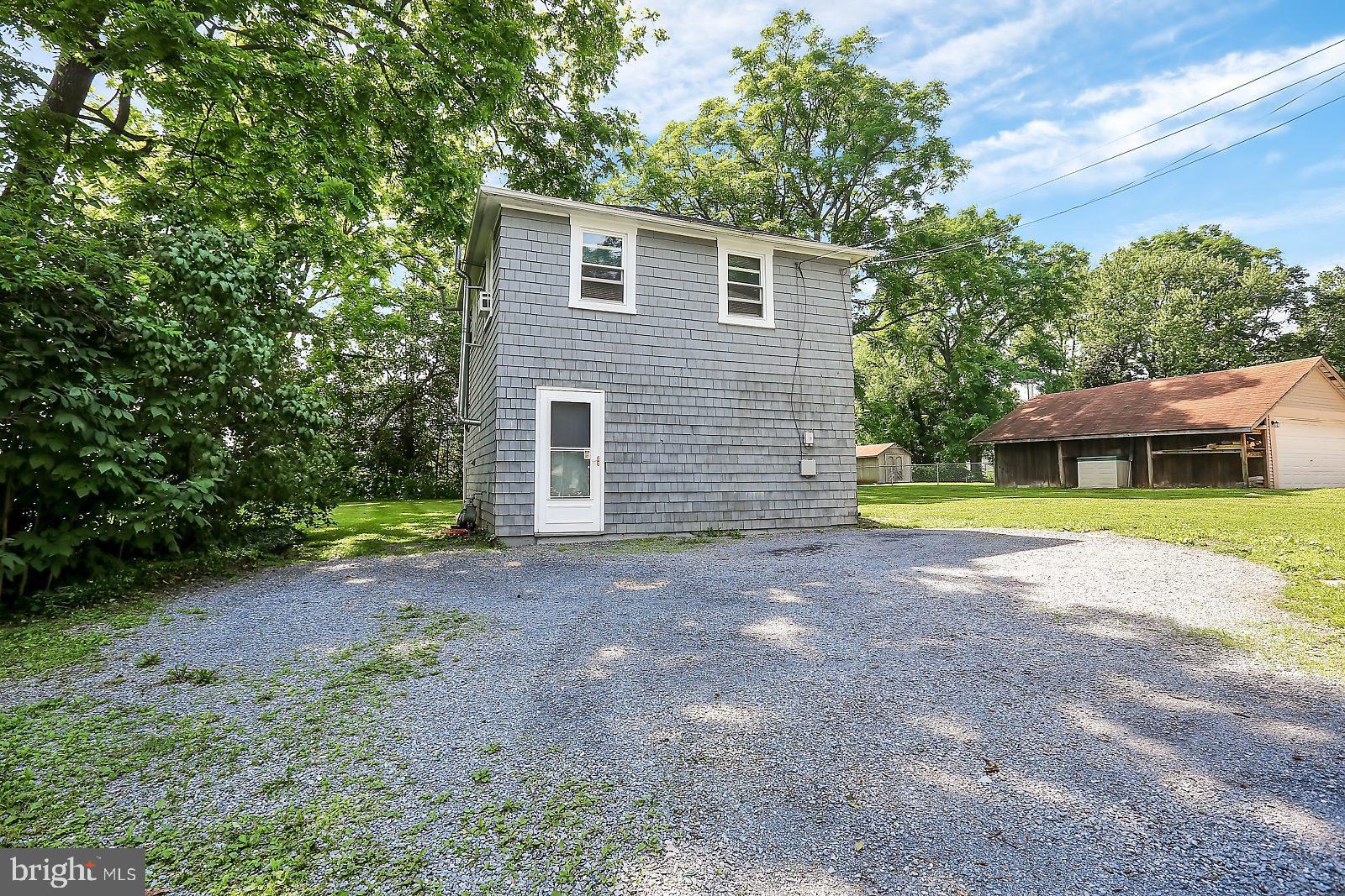 3525 St James Road Windsor Mill, MD 21244 - Photo 24 of 27 a view of a house with a backyard