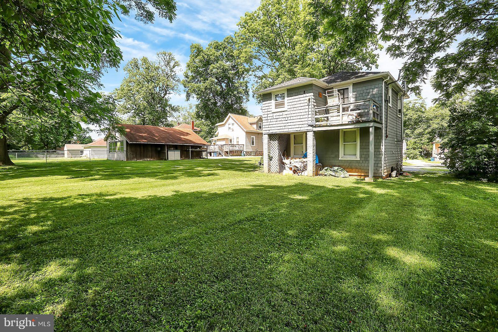3525 St James Road Windsor Mill, MD 21244 - Photo 26 of 27 a front view of a house with garden