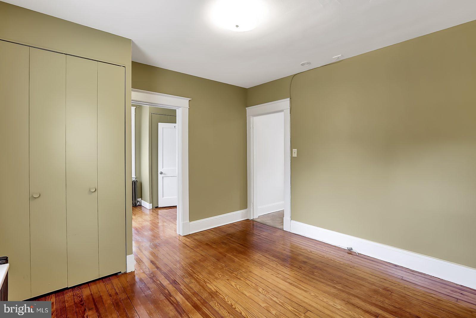 3525 St James Road Windsor Mill, MD 21244 - Photo 10 of 27 a view of hallway with wooden floor