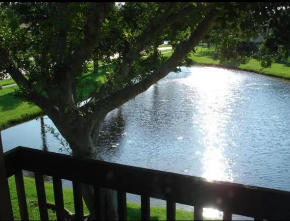 a view of a wooden fence