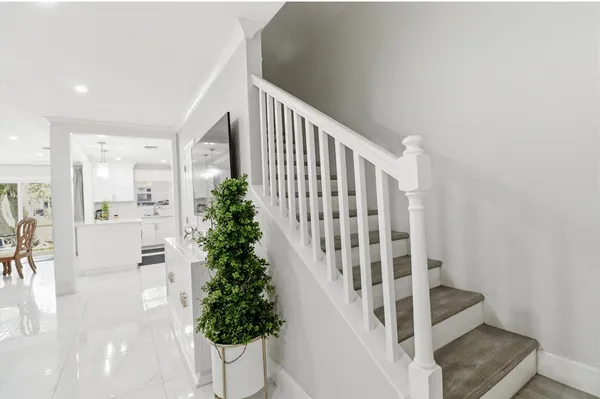 a view of entryway with wooden floor