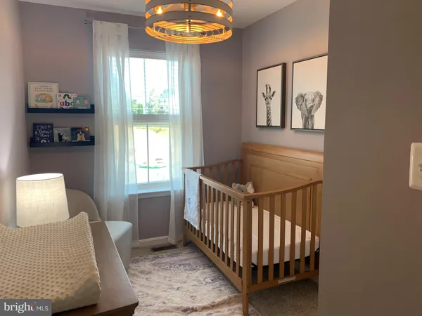 a bathroom with a shower and a toilet