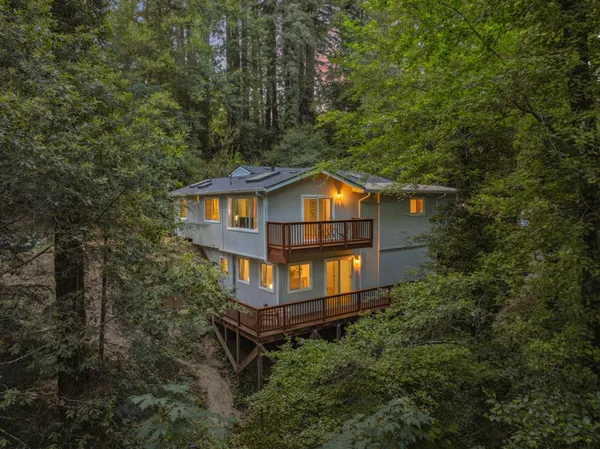 a backyard of a house with lots of green space