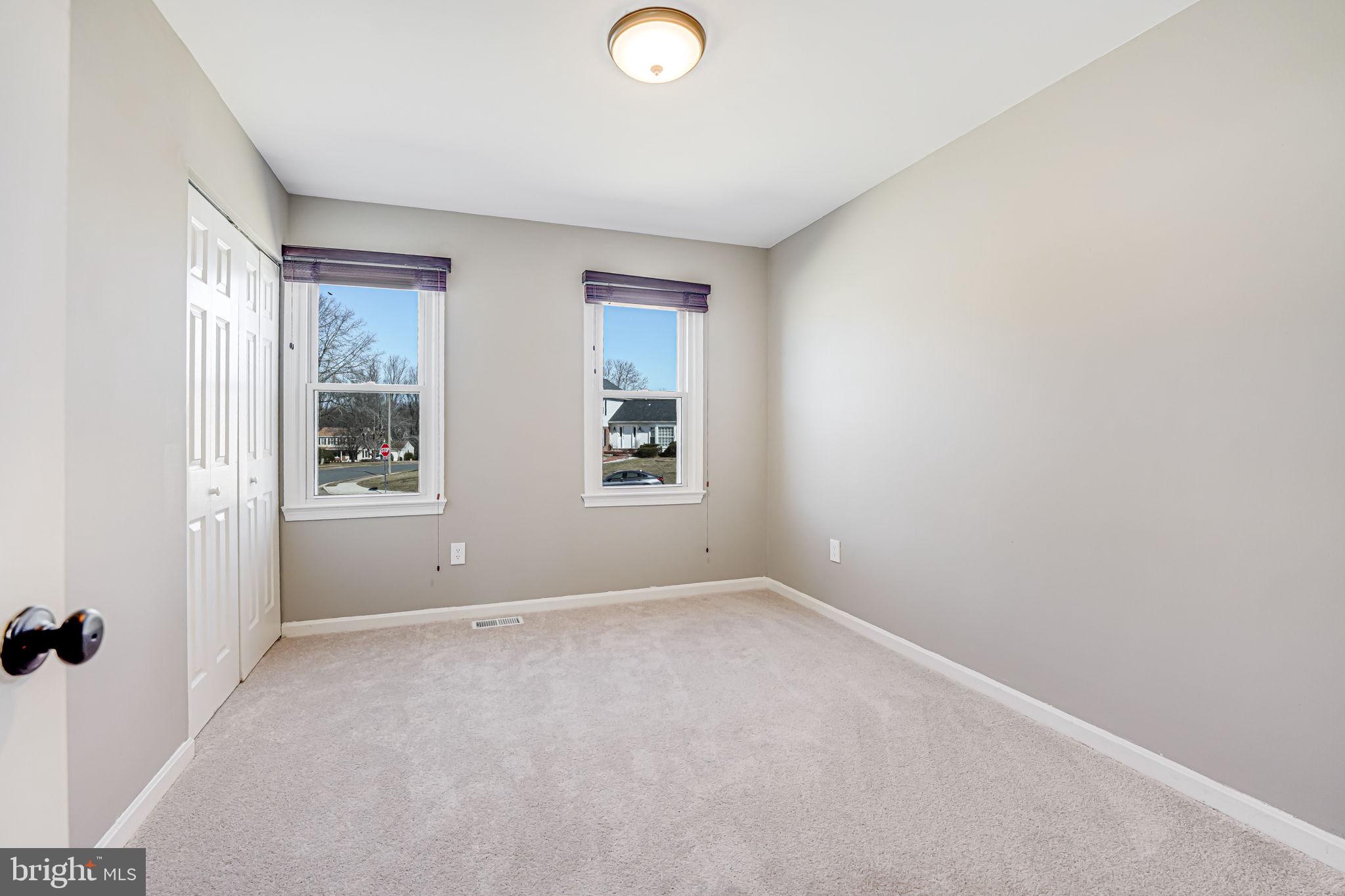 7829 Richfield Road Springfield, VA 22153 - Photo 19 of 34 an empty room with windows