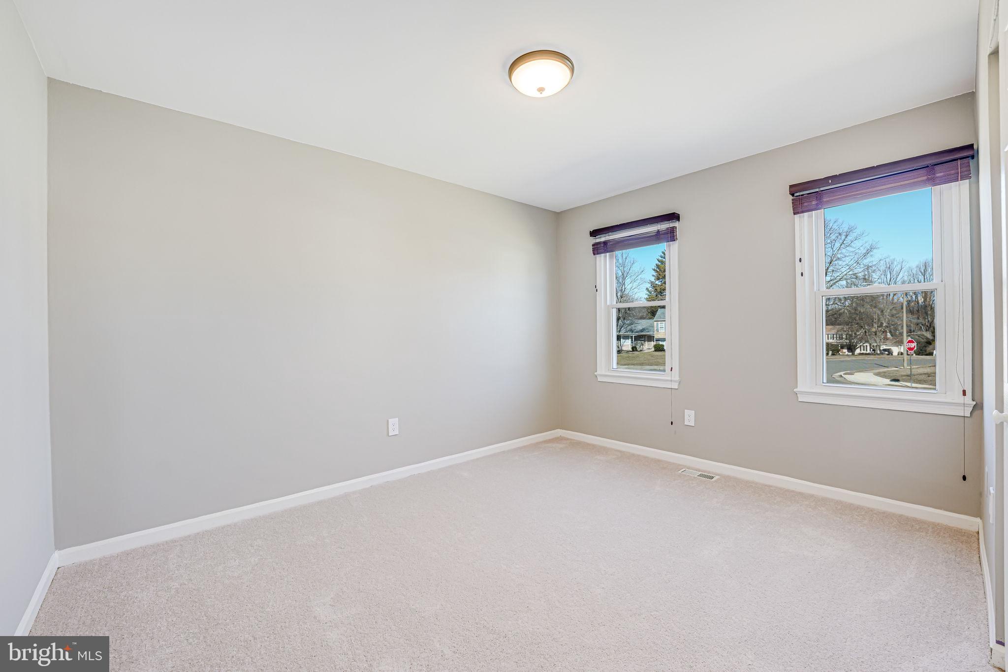 7829 Richfield Road Springfield, VA 22153 - Photo 22 of 34 an empty room with windows