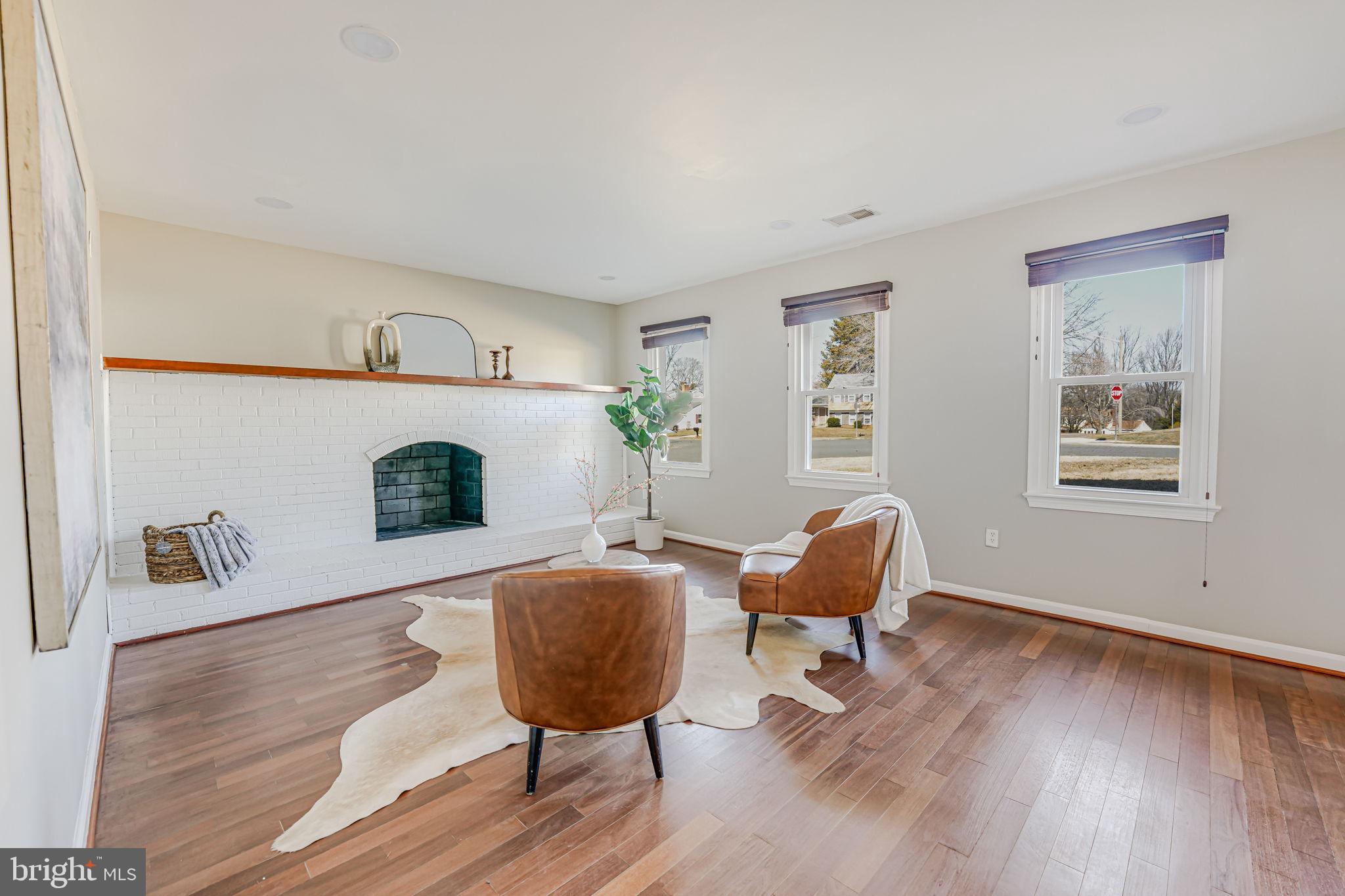 7829 Richfield Road Springfield, VA 22153 - Photo 26 of 34 a living room with furniture and a chair