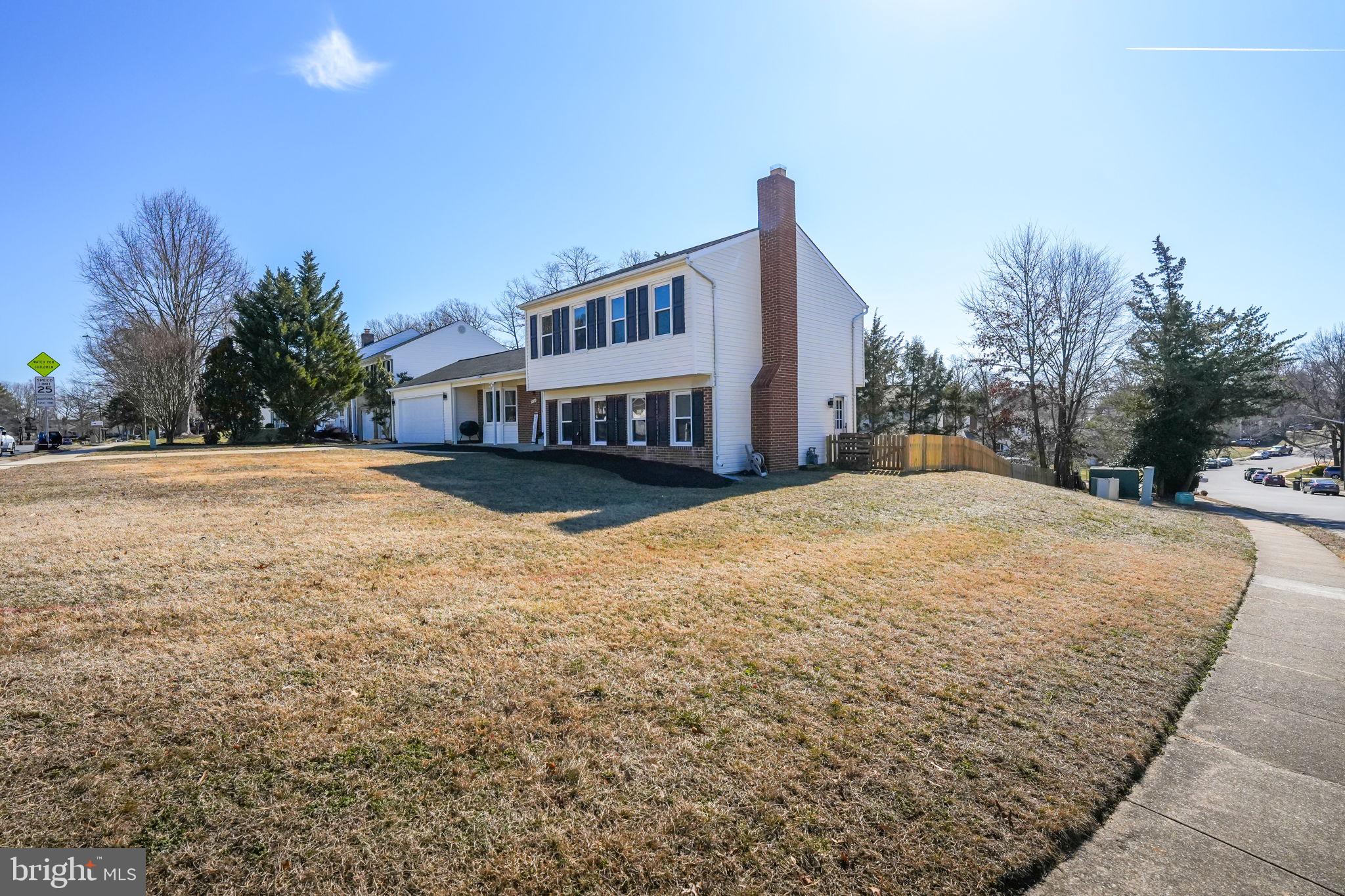 7829 Richfield Road Springfield, VA 22153 - Photo 3 of 34 a view of a house with a yard next to a road