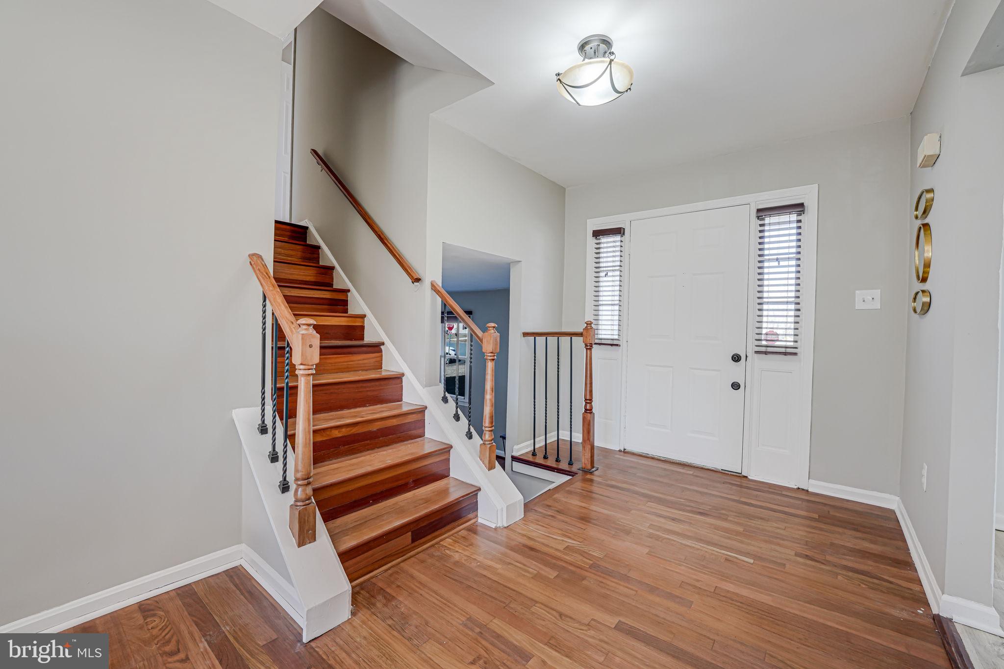 7829 Richfield Road Springfield, VA 22153 - Photo 5 of 34 wooden floor in an empty room with a window