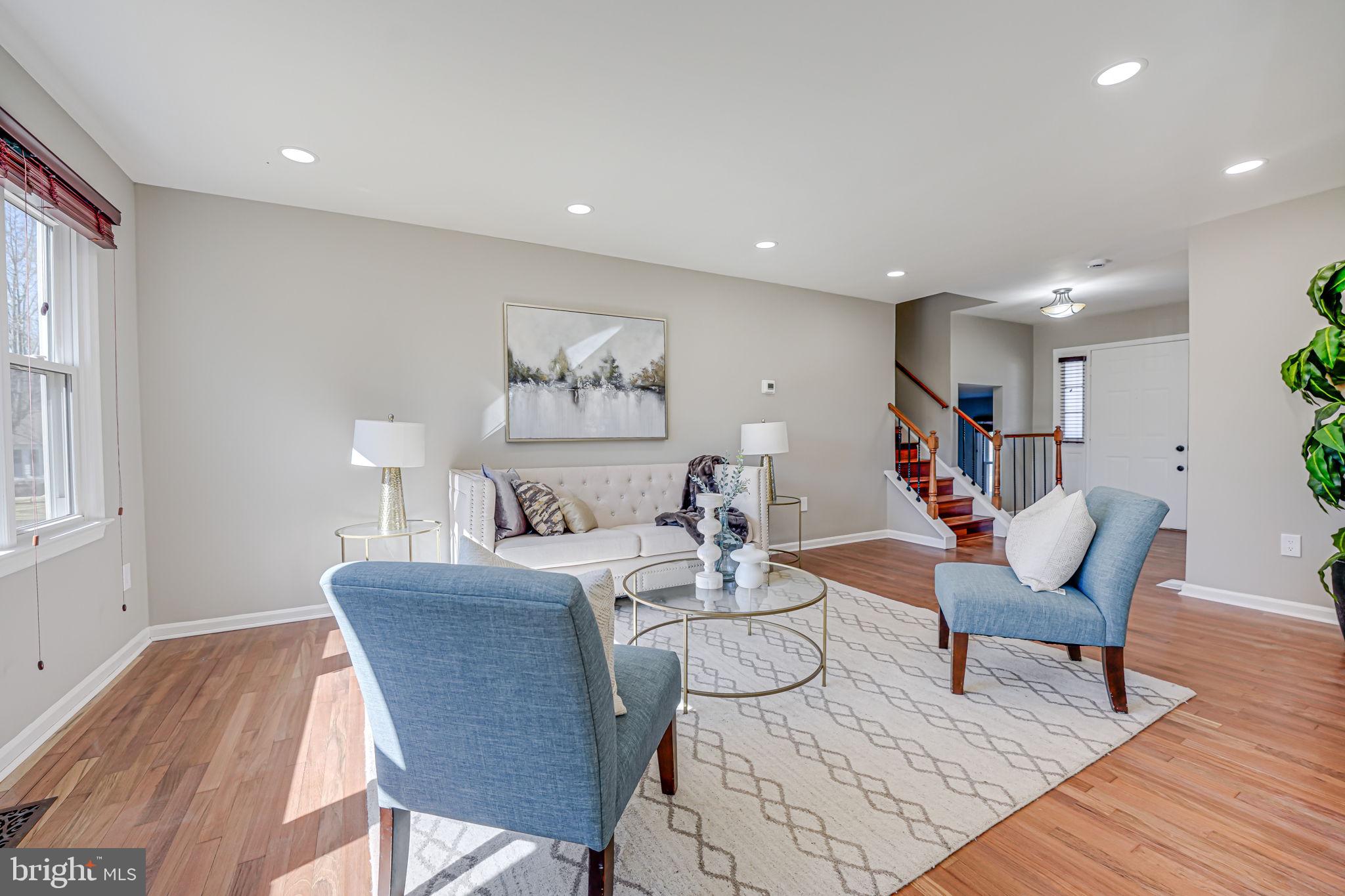 7829 Richfield Road Springfield, VA 22153 - Photo 7 of 34 a view of a dining room with furniture and a wooden floor