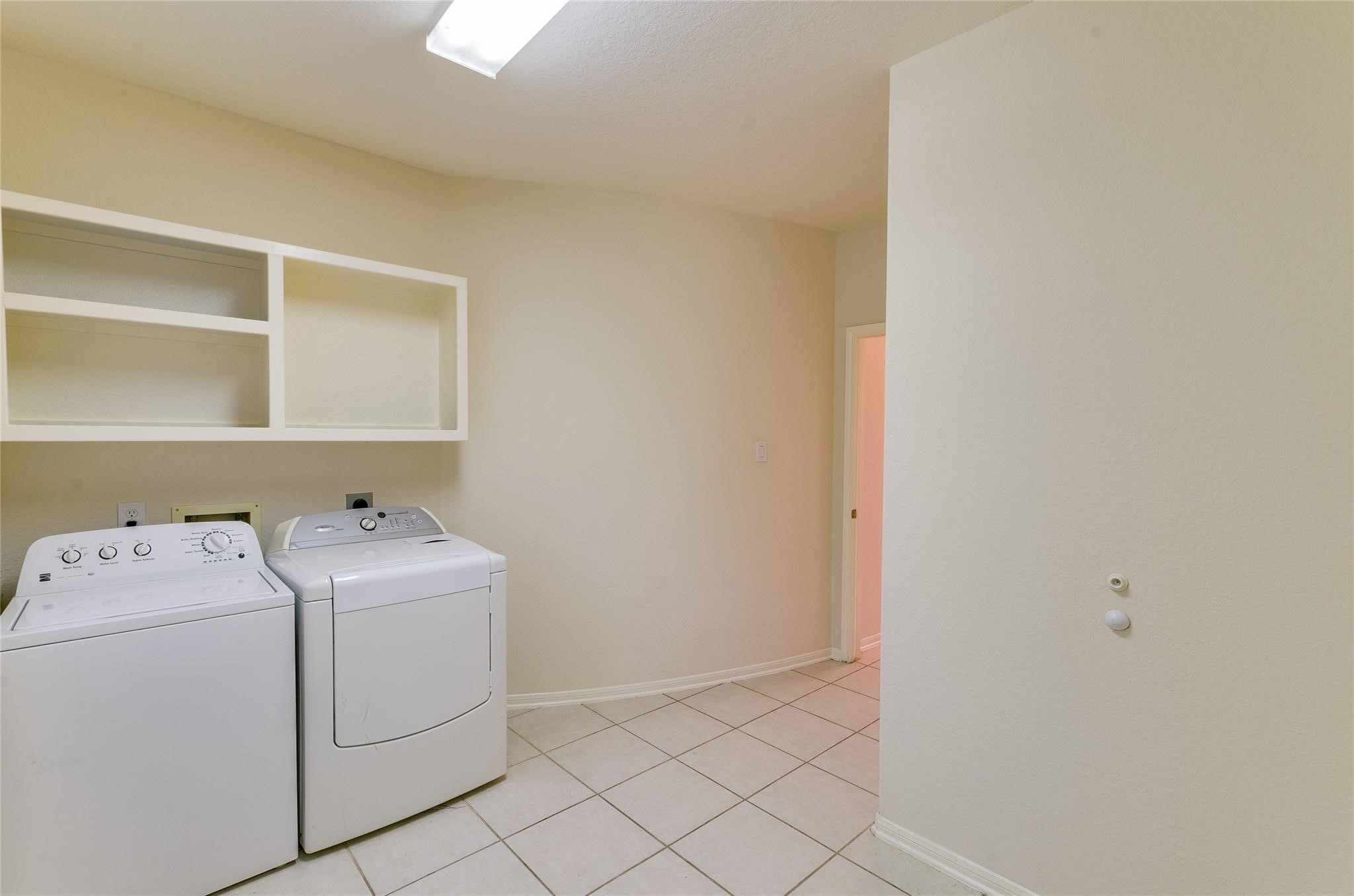 4019 Angel Spring Drive Sugar Land, TX 77479 - Photo 19 of 50 a utility room with dryer and washer