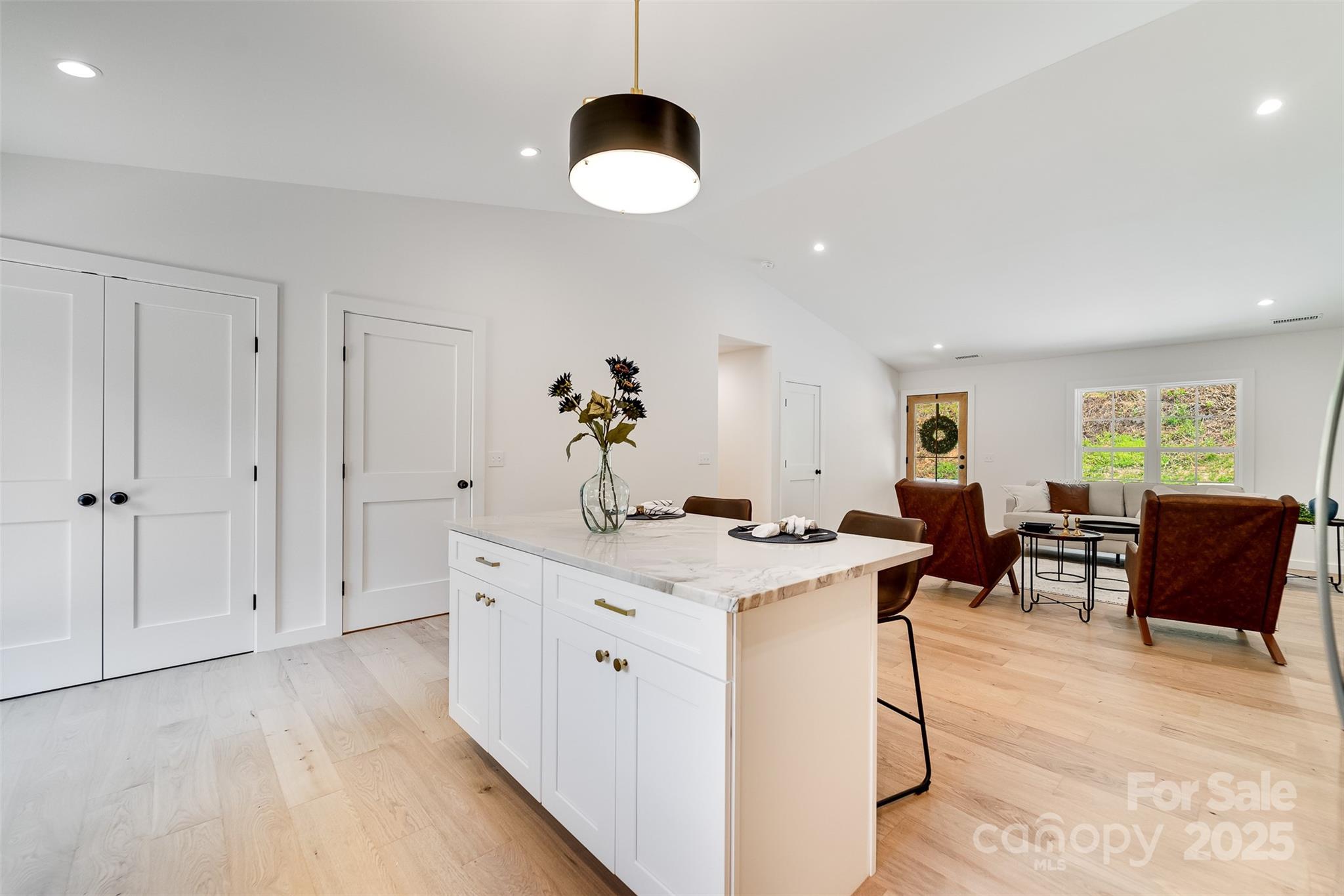 22 Crossing Lane Sylva, NC 28779 - Photo 14 of 44 a view of a kitchen area with furniture and wooden floor