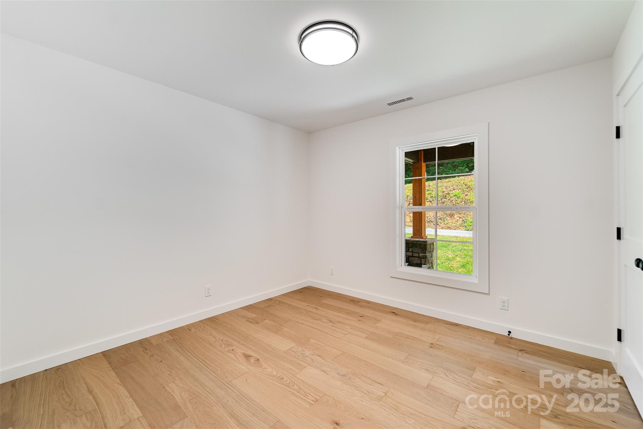 22 Crossing Lane Sylva, NC 28779 - Photo 15 of 44 an empty room with a window