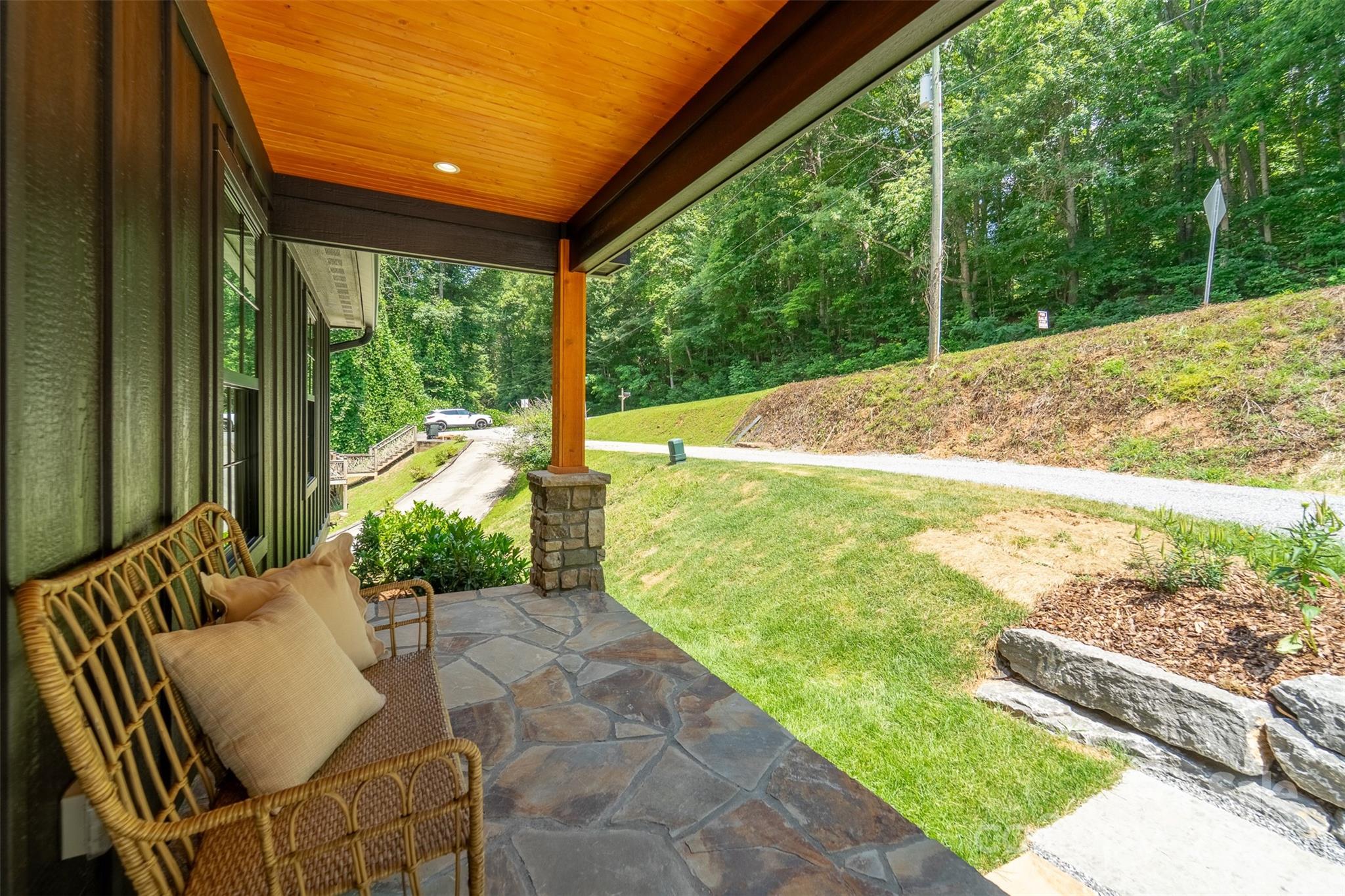 22 Crossing Lane Sylva, NC 28779 - Photo 25 of 44 a view of backyard with swimming pool and outdoor seating