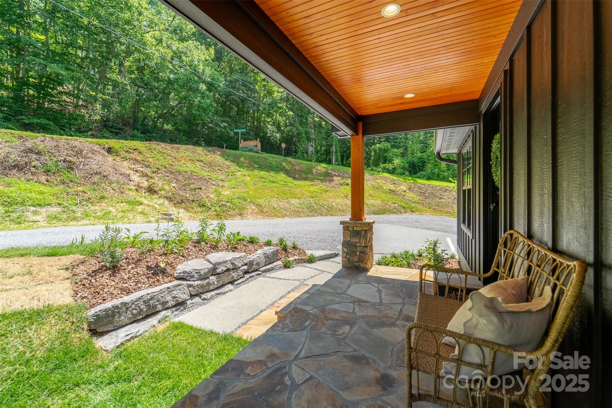 22 Crossing Lane Sylva, NC 28779 - Photo 26 of 44 a view of a swimming pool with a lounge chairs
