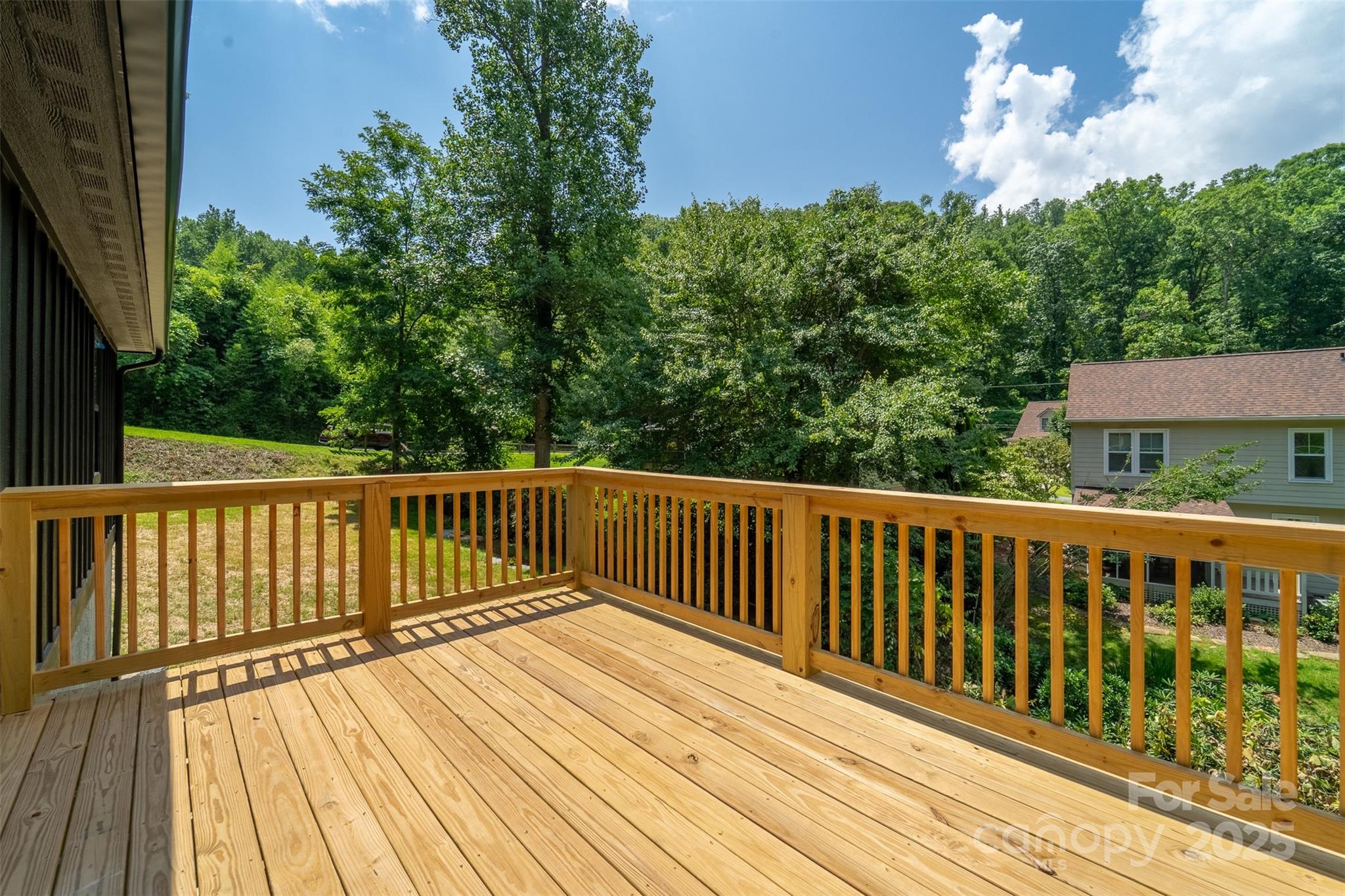 22 Crossing Lane Sylva, NC 28779 - Photo 28 of 44 a view of balcony with wooden floor and fence