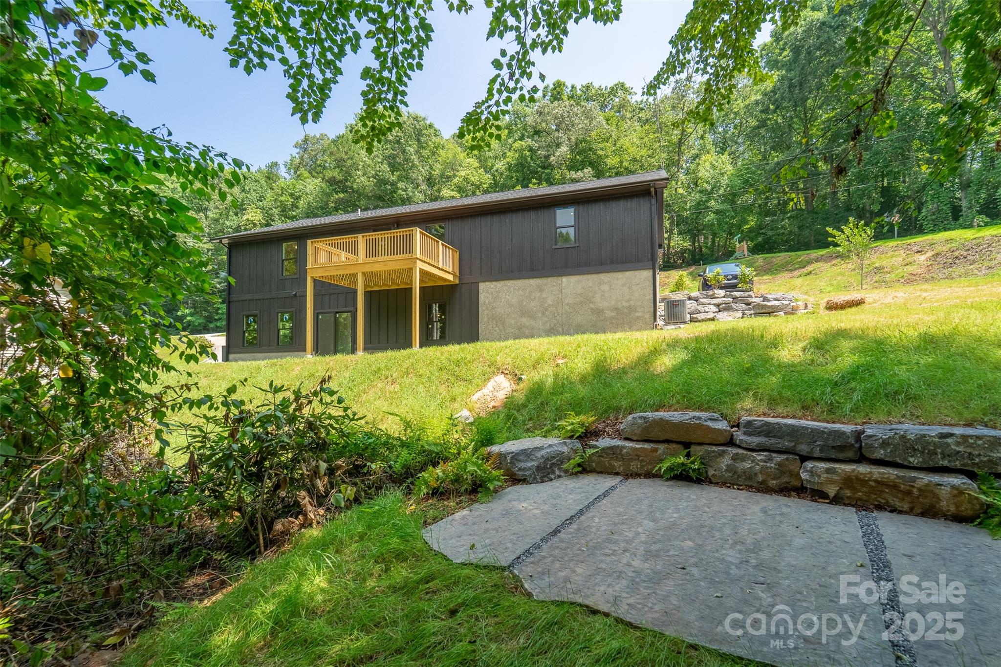 22 Crossing Lane Sylva, NC 28779 - Photo 37 of 44 a view of a house with a yard