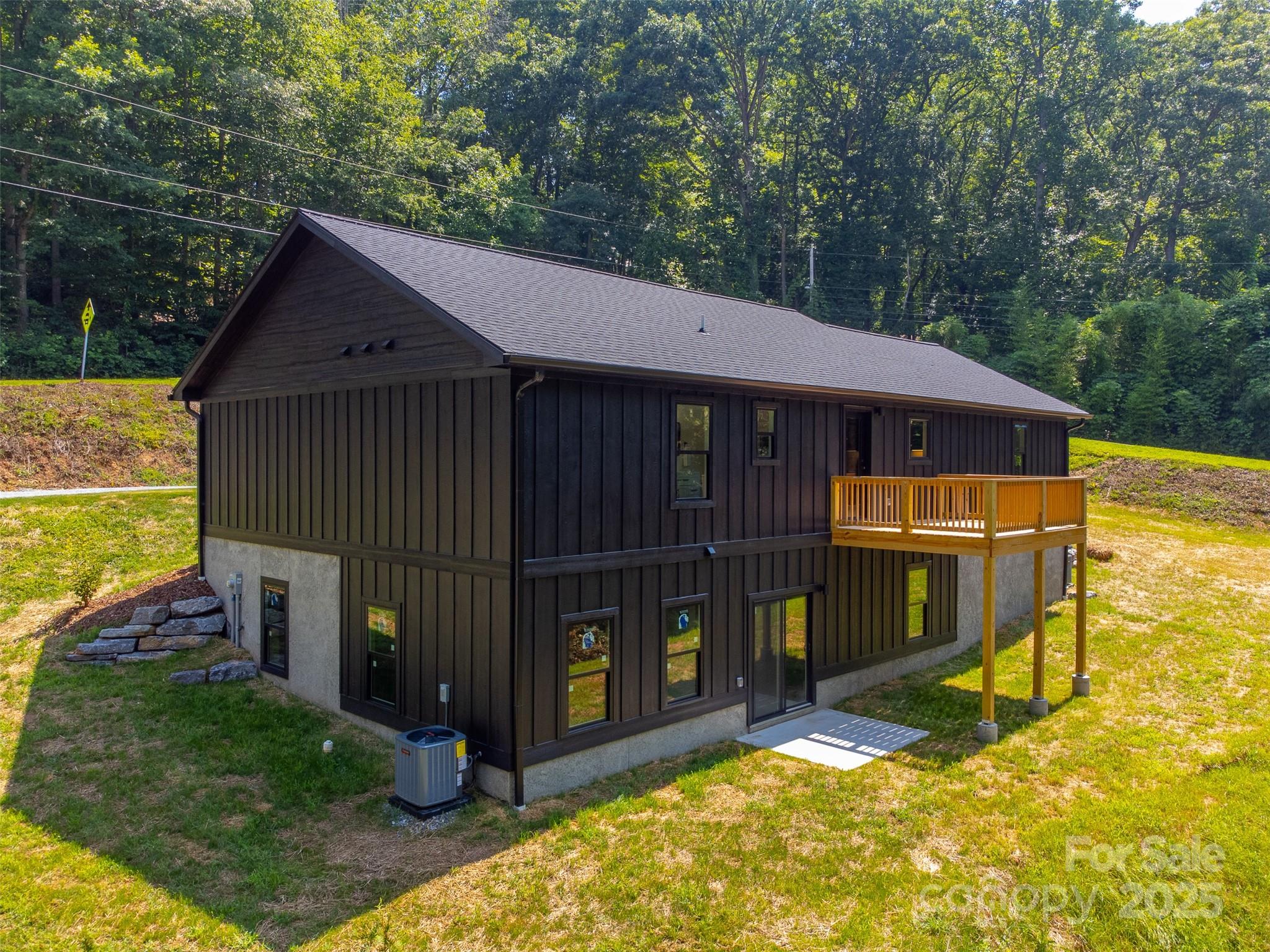 22 Crossing Lane Sylva, NC 28779 - Photo 42 of 44 a view of a house with backyard and porch