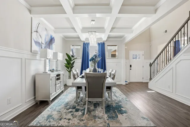 a living room with fireplace furniture and a flat screen tv