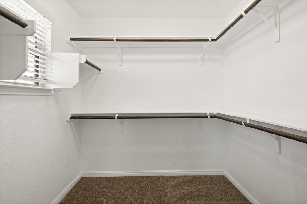 719 Coconut Grove Street Pflugerville, TX 78660 - Photo 21 of 31 a view of small space with racks on the wall