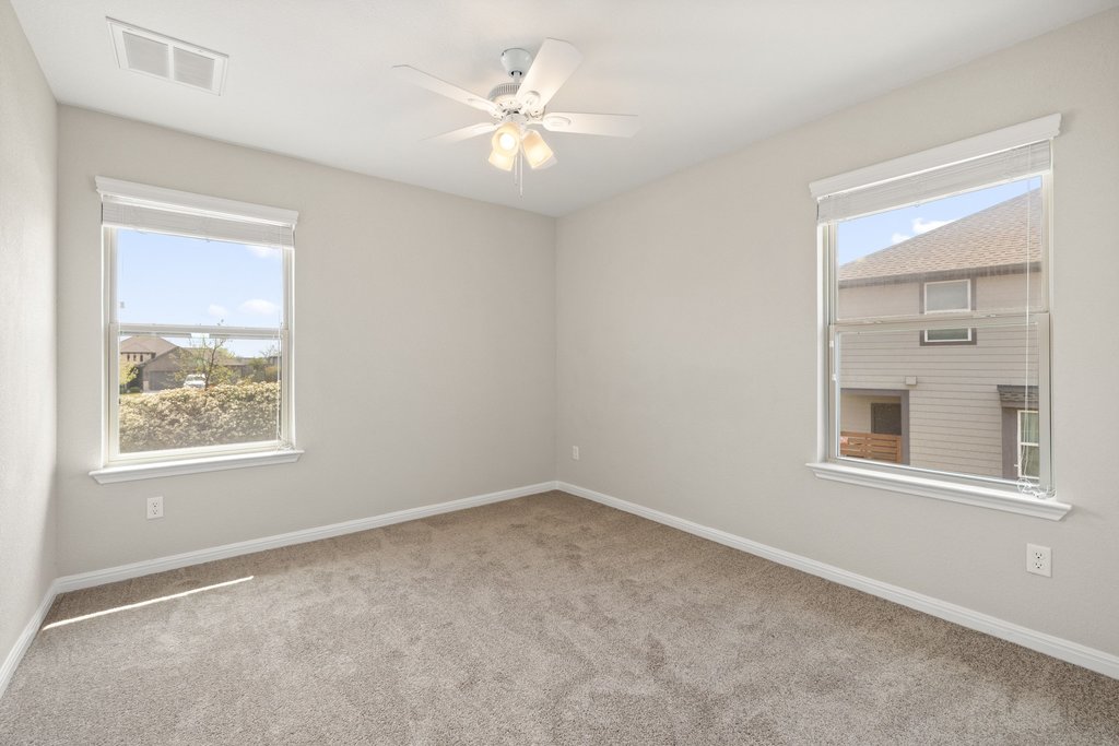 719 Coconut Grove Street Pflugerville, TX 78660 - Photo 24 of 31 an empty room with a window