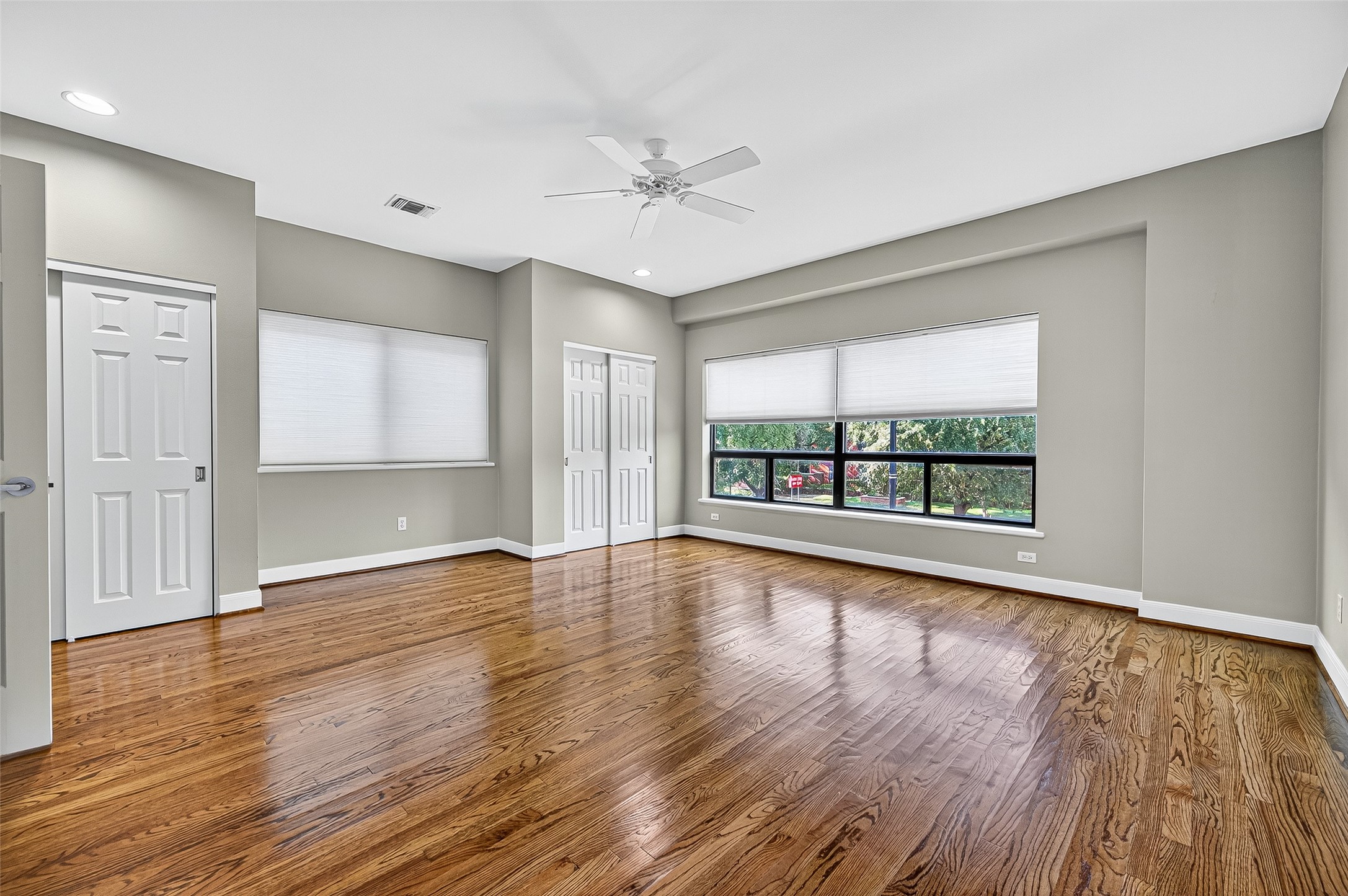 3027 Bissonnet Street Houston, TX 77005 - Photo 32 of 47 Secondary bedroom with hardwood floors — works great as a guest room or home office