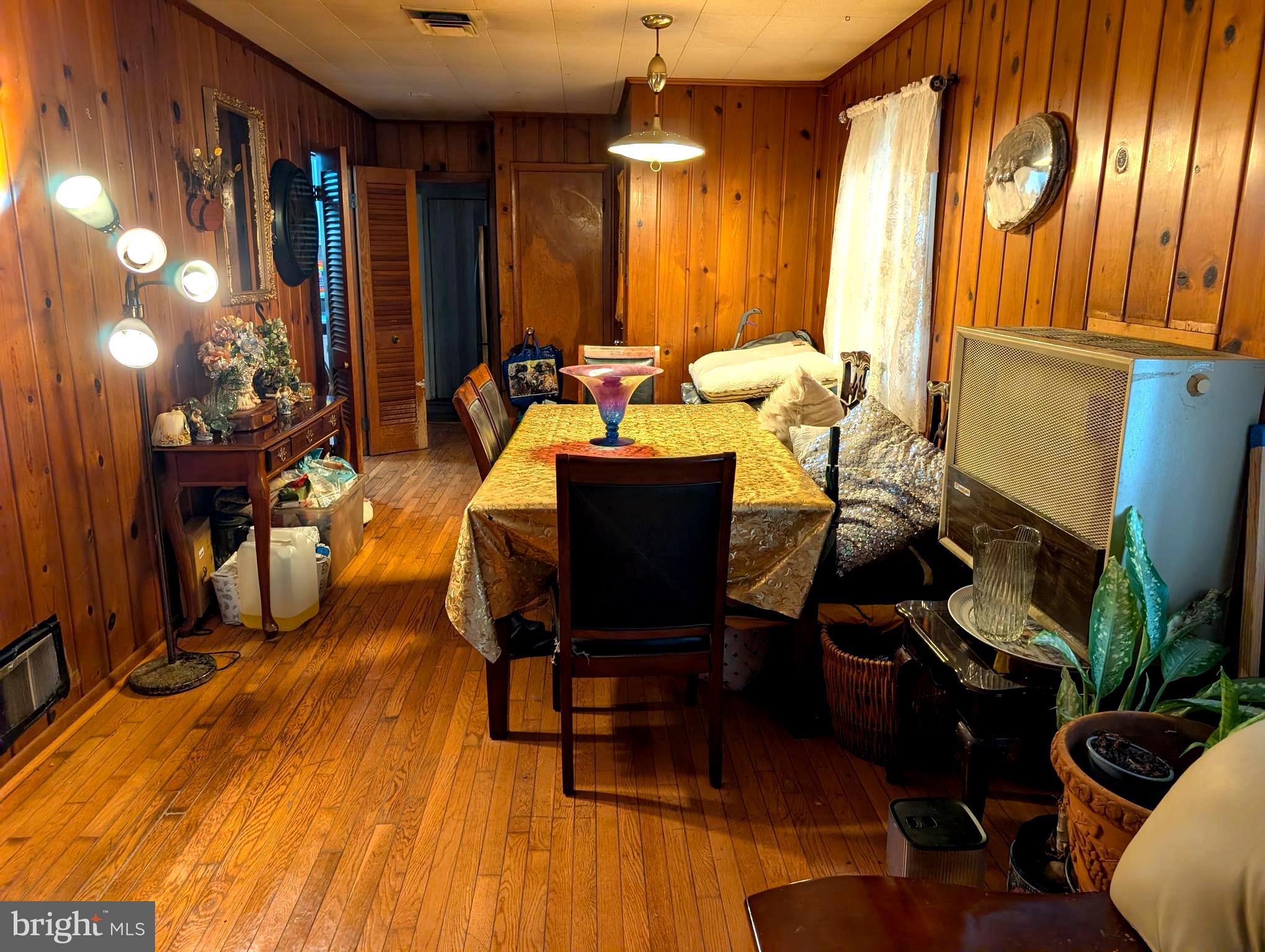 12816 Valleywood Drive Silver Spring, MD 20906 - Photo 13 of 20 a living room with furniture rug and wooden floor