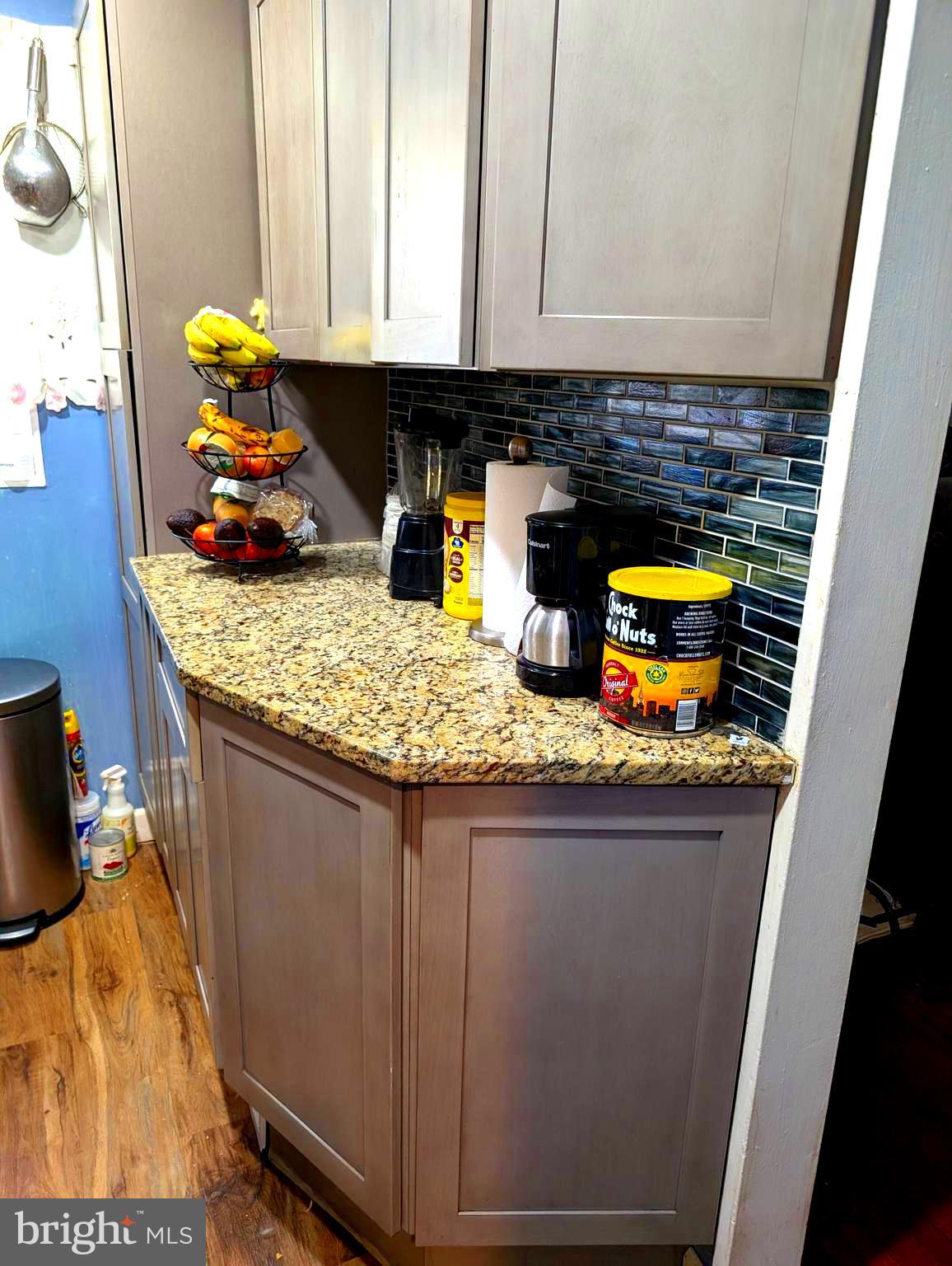 12816 Valleywood Drive Silver Spring, MD 20906 - Photo 10 of 20 a bathroom with a granite countertop sink and a mirror