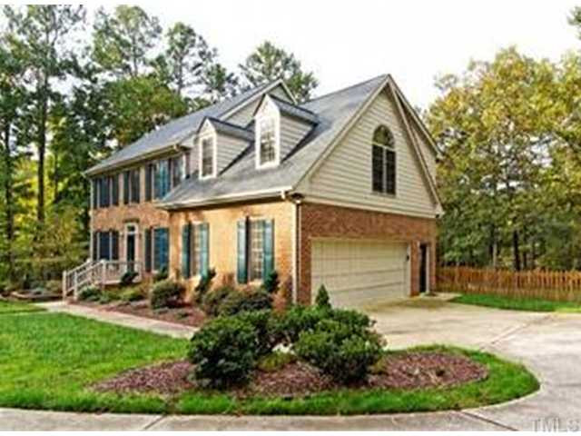 10813 Cahill Road Raleigh, NC 27614 - Photo 19 of 25 The side entry garage and professional landscaping enhance the curb appeal of this brick 4 bedroom home! Exterior Front