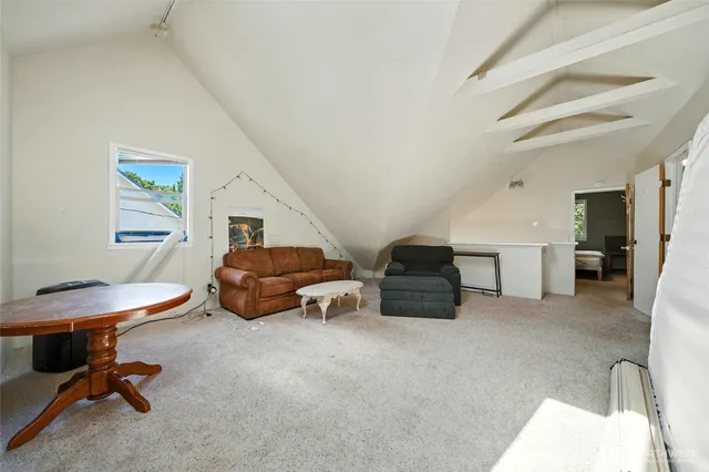 a room with furniture and a chair