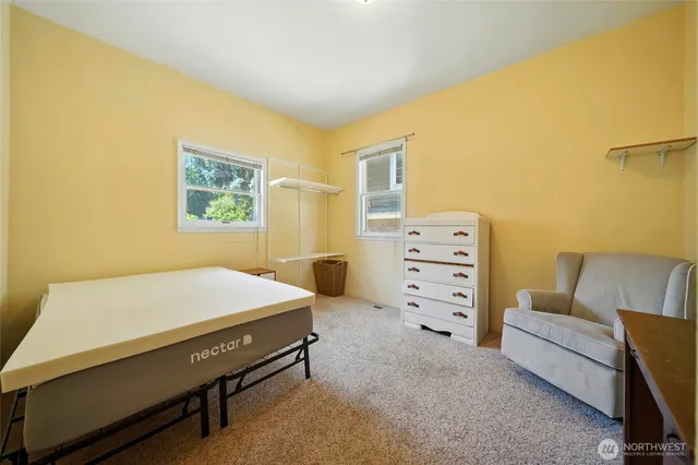 a room with furniture and a window