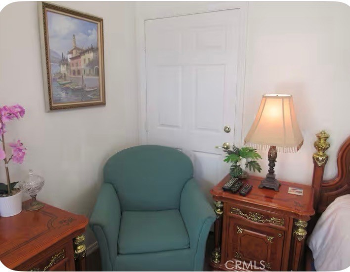 444 Pier Avenue, Unit 36 Oceano, CA 93445 - Photo 5 of 7 a living room with furniture and a potted plant