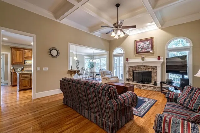 a view of a hallway view with three rooms