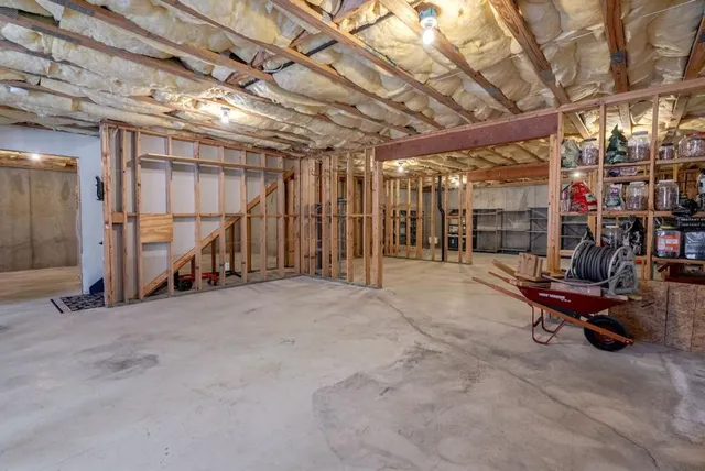 a view of patio with a table chairs and a backyard