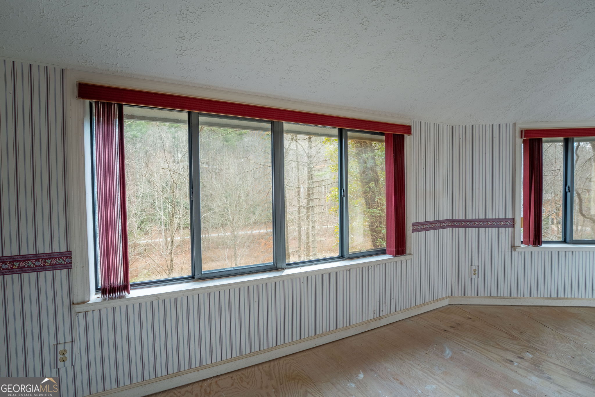 159 Clare Lane Rabun Gap, GA 30568 - Photo 20 of 41 a view of an empty room with a window