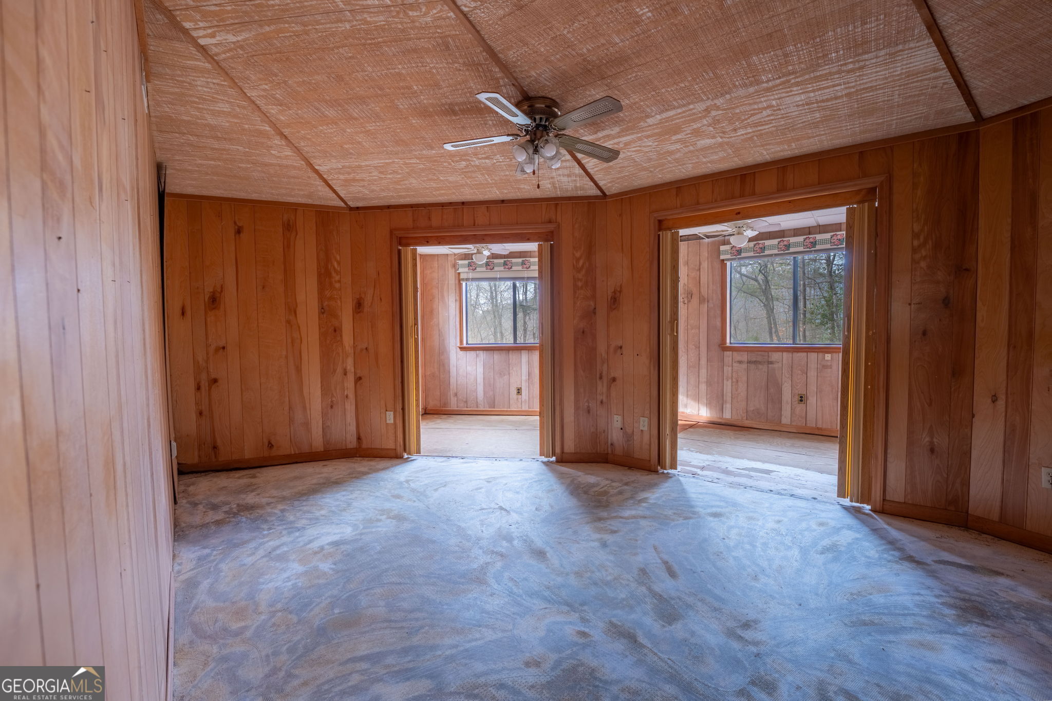159 Clare Lane Rabun Gap, GA 30568 - Photo 26 of 41 an empty room with fan and windows