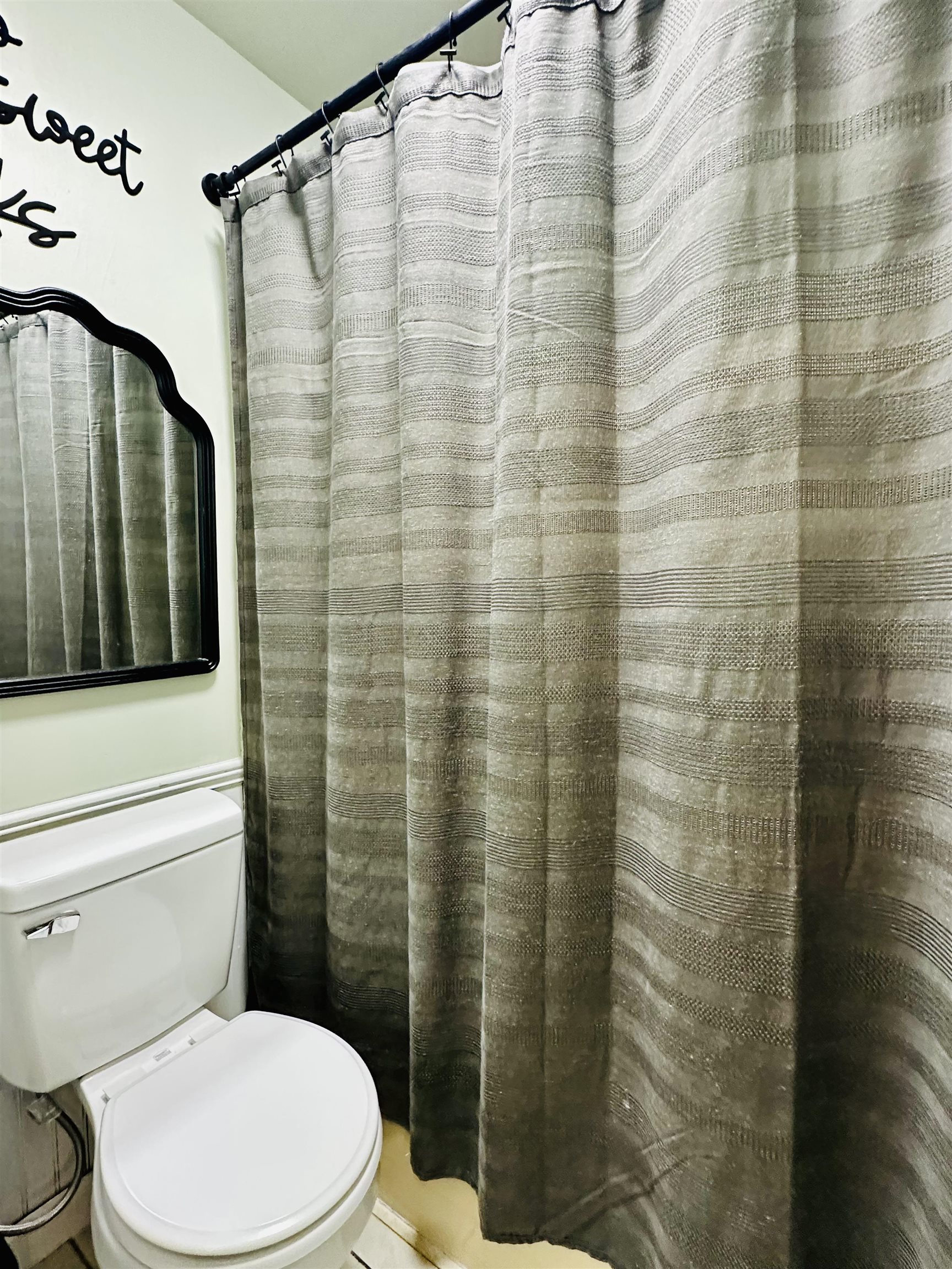 7120 Powell Chapel Road Hornsby, TN 38044 - Photo 14 of 29 a bathroom with a toilet and shower