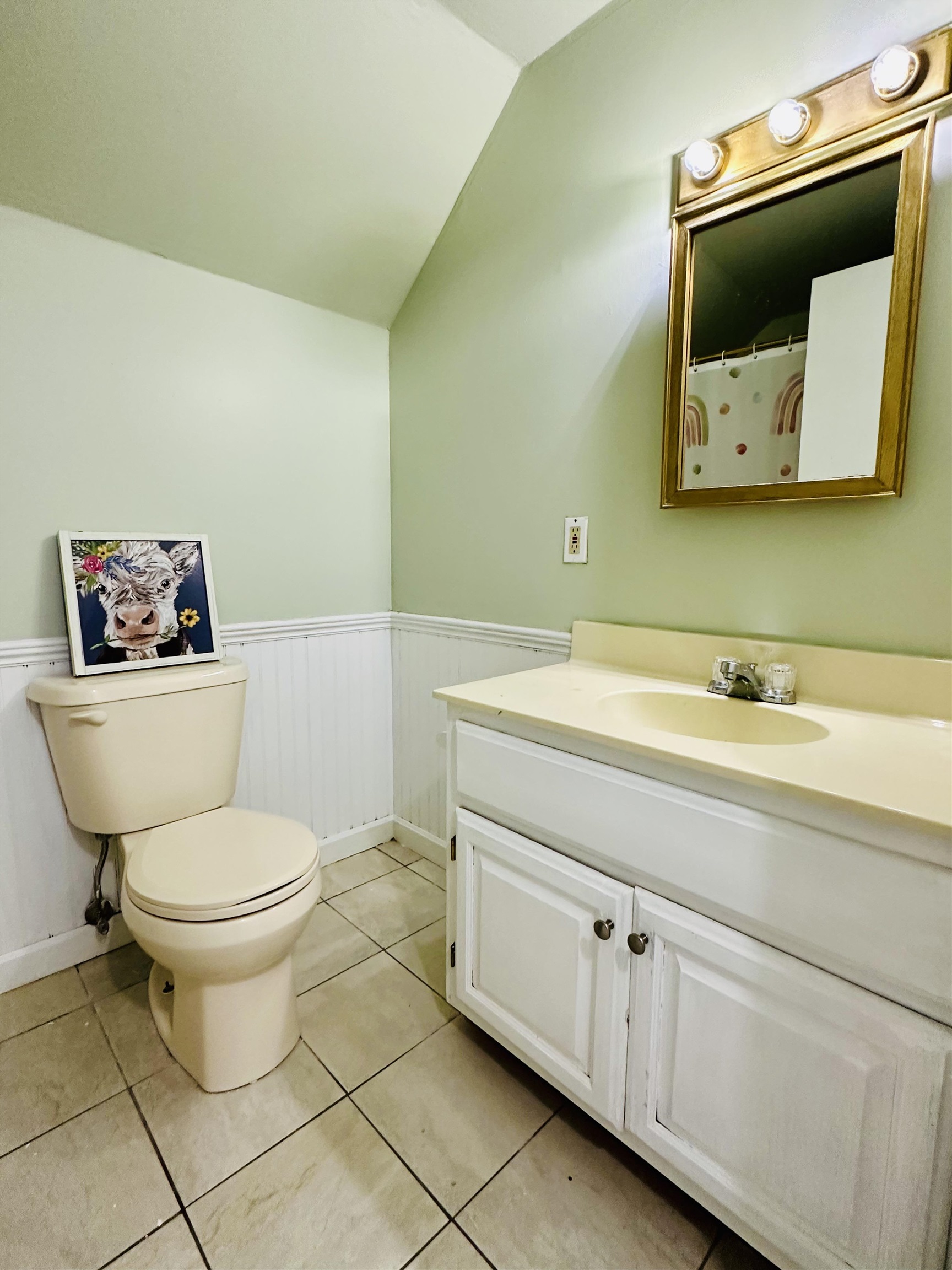 7120 Powell Chapel Road Hornsby, TN 38044 - Photo 16 of 29 a bathroom with a toilet sink and mirror